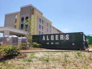 Algers Excavation dumpster.